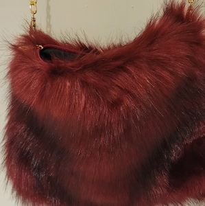 Maroon fury purse.